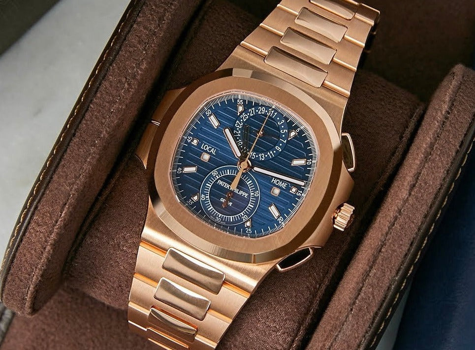 FACTORY SEALED PATEK PHILIPPE WHITE GOLD NAUTILUS WITH PERPETUAL